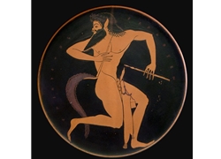 Satyr with Pipes and a Pipe Case - Attic Red-Figure Plate, 520-500 BC