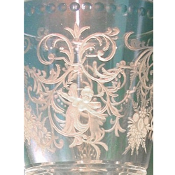 Engraved crystal glass goblet. The stem cut into facets